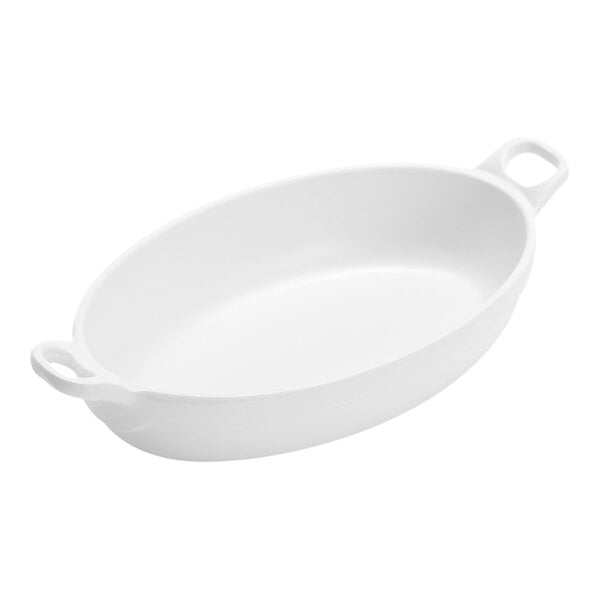 A white oval dish with two handles, shown on a plain background.