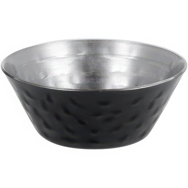 A black stainless steel sauce cup with a textured surface and silver rim.