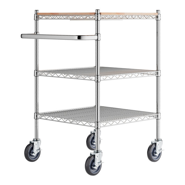 A Regency chrome utility cart with three shelves and wheels.