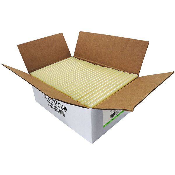 A white box with a yellow label that reads "Surebonder" and contains tan glue sticks.