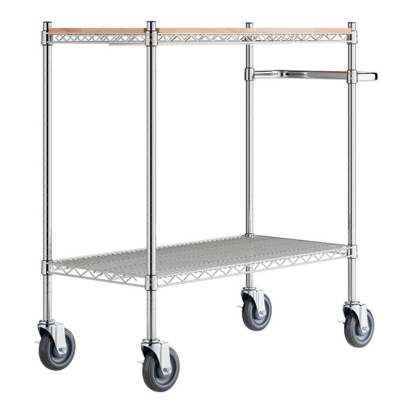 A Regency chrome utility cart with wooden shelves and black wheels.
