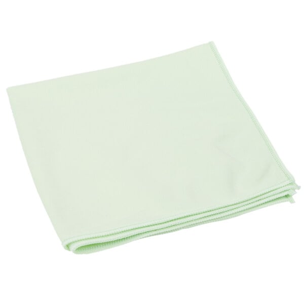 A stack of folded light green Unger microfiber window wipers.
