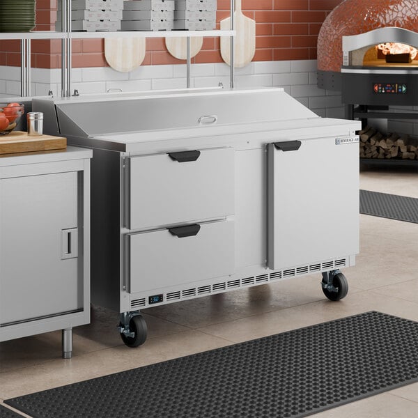 A stainless steel 60-inch refrigerated sandwich prep table with one door and two drawers on casters.