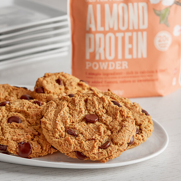 A plate of almond protein cookies with chocolate chips.