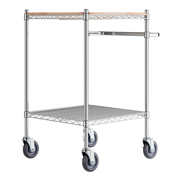 A Regency chrome utility cart with wooden shelves and wheels.