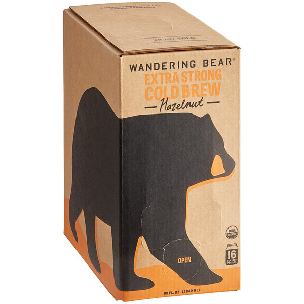 A brown and black Wandering Bear bag in box with a bear on it.