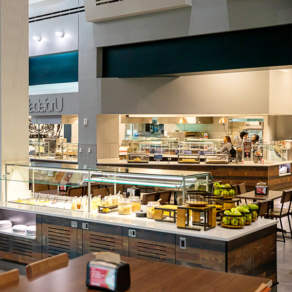 A Vollrath custom serving system on a cafeteria counter.