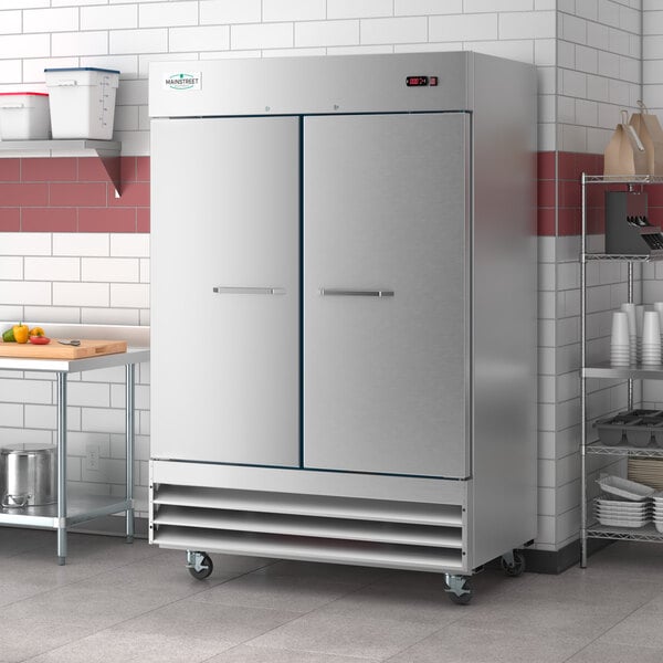 A stainless steel Main Street Equipment reach-in freezer with two solid doors.