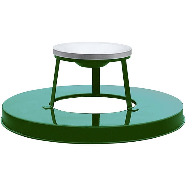 A green and silver steel lid with a white circle on top.
