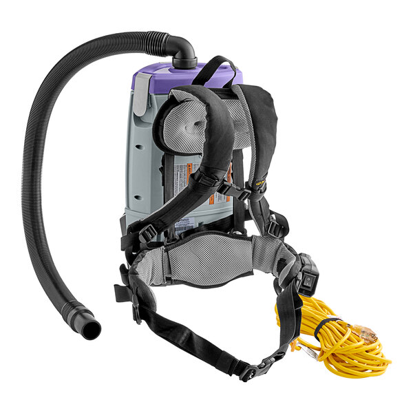 A ProTeam backpack vacuum with hose and wand attached.