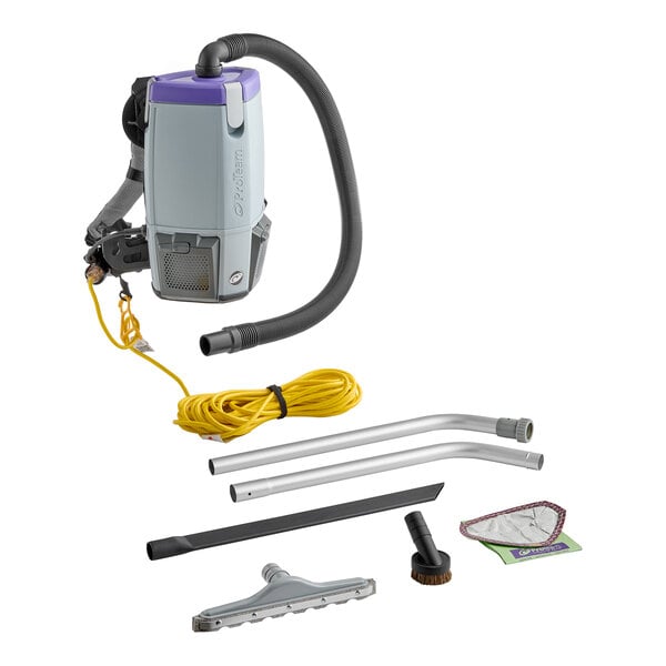 A ProTeam backpack vacuum with hose and tools including a felt brush.