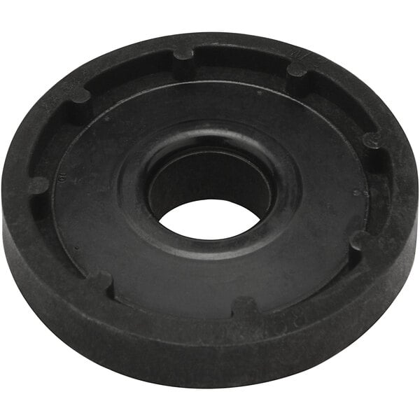 A black round rubber disc with a hole in the center.