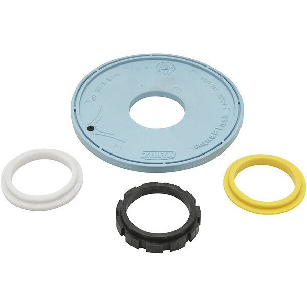 A group of yellow and blue rubber gaskets and seals for Zurn AquaFlush and AquaVantage valves.