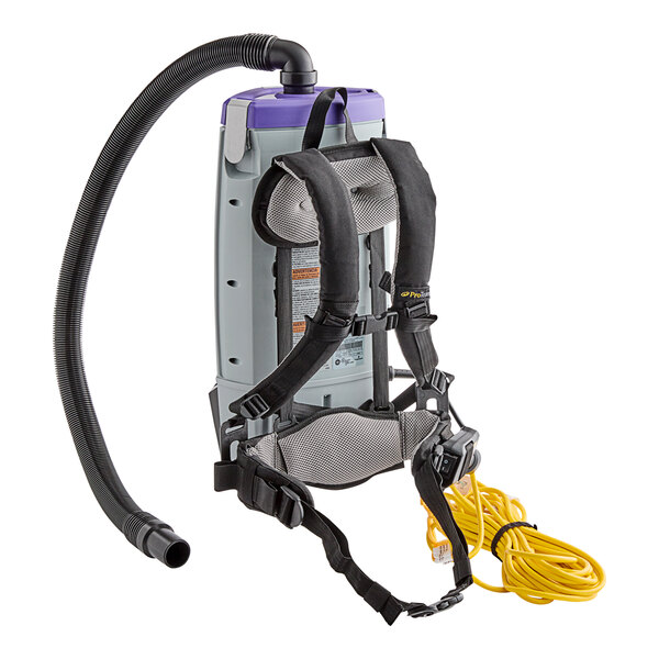 A ProTeam backpack vacuum with straps and a hose.