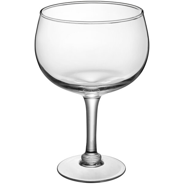 An Acopa clear wine glass with a stem.