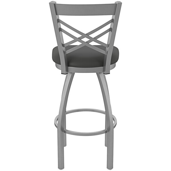 A Holland Bar Stool stainless steel outdoor restaurant bar stool with a black cushion and backrest.