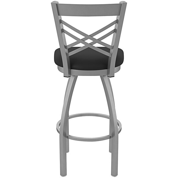 A Holland Bar Stool stainless steel outdoor counter stool with black cushion and backrest.