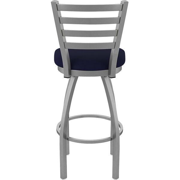 A Holland Bar Stool outdoor restaurant bar stool with a blue cushion and stainless steel frame.