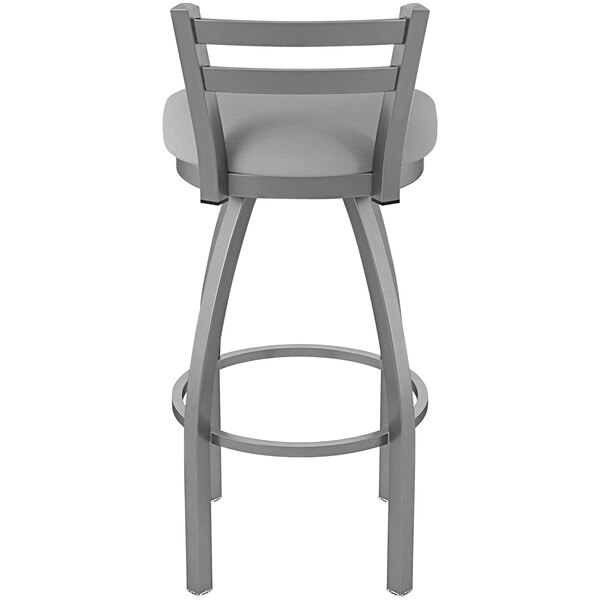 A gray Holland Bar Stool with a low back and a Breeze Sidewalk seat.
