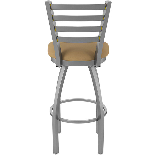 A Holland Bar Stool outdoor counter stool with a beige cushion on the seat and back.