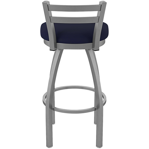 A Holland Bar Stool stainless steel outdoor counter stool with a Breeze Sapphire seat.
