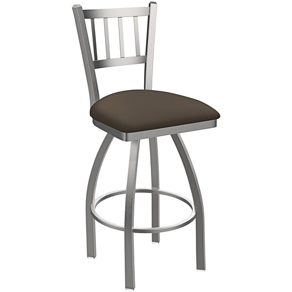 A Holland Bar Stool outdoor counter stool with a brown slat back and stainless steel legs with a brown cushion.