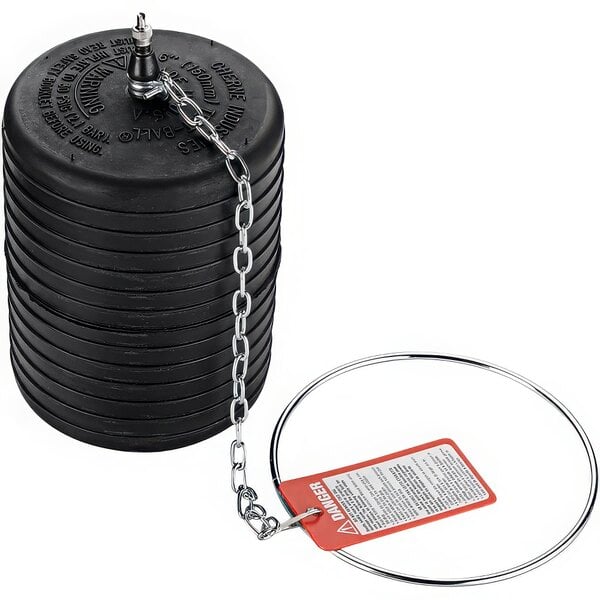 A black cylinder with a chain attached to it.