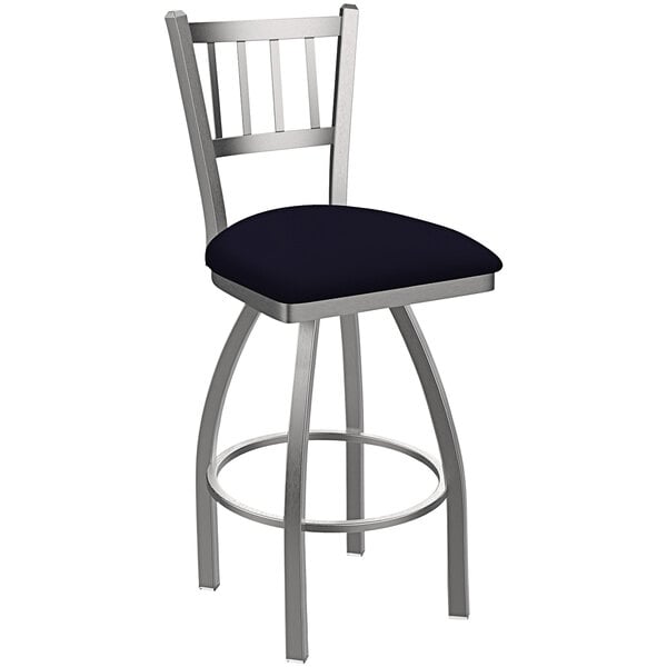 A Holland Bar Stool stainless steel slat back swivel bar stool with a Breeze Sapphire cushion.