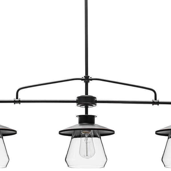 An oil-rubbed bronze pendant light fixture with three clear glass shades.