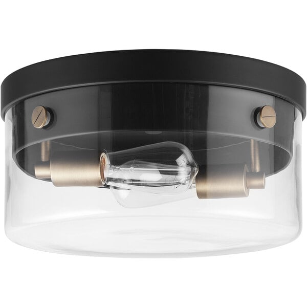 A Globe matte black and brass ceiling light fixture with clear glass shades.