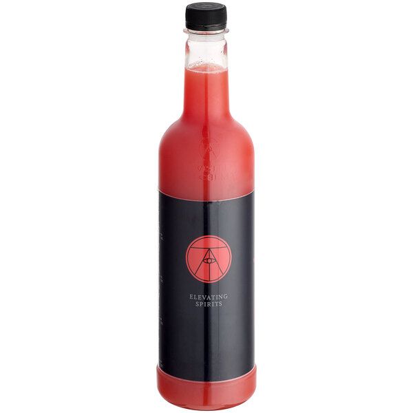 A bottle of Twisted Alchemy Cold-Pressed Watermelon Juice with a black and red label on a table in a cocktail bar.