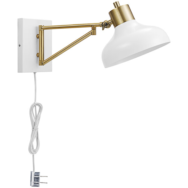 A white wall lamp with a gold swing arm and plug-in cord.