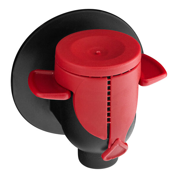 A red and black Twisted Alchemy bag in box with a red lid.