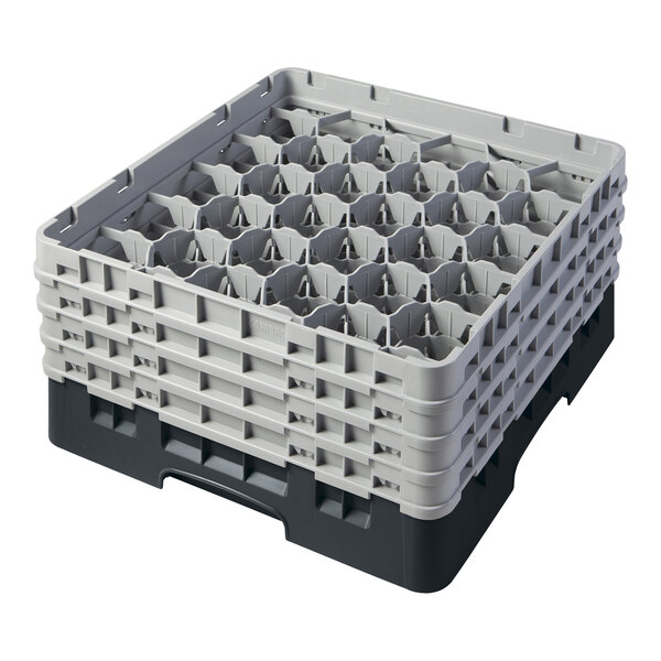 A black plastic Cambro rack with many small compartments and grey and white extenders.