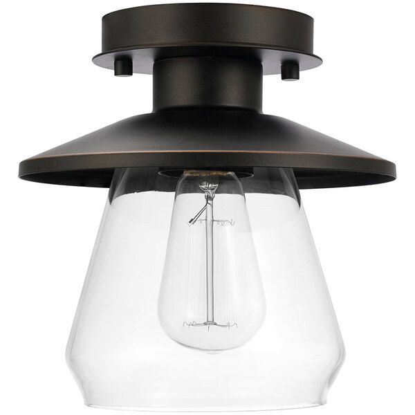An oil-rubbed bronze semi-flush mount light fixture with clear glass shade.