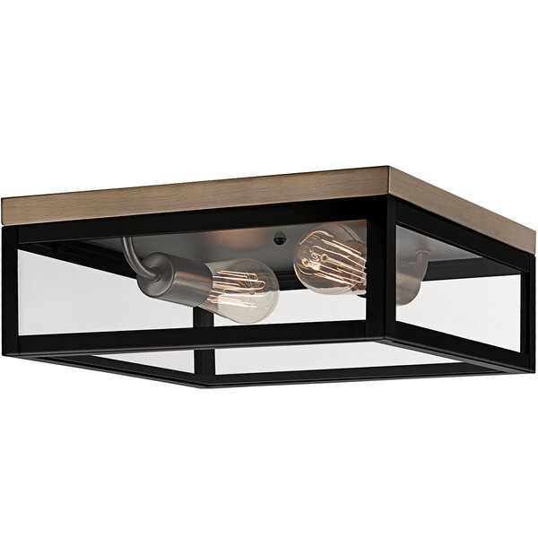 A Globe Rustic dark bronze and antique brass flush mount light fixture with a couple of light bulbs inside.