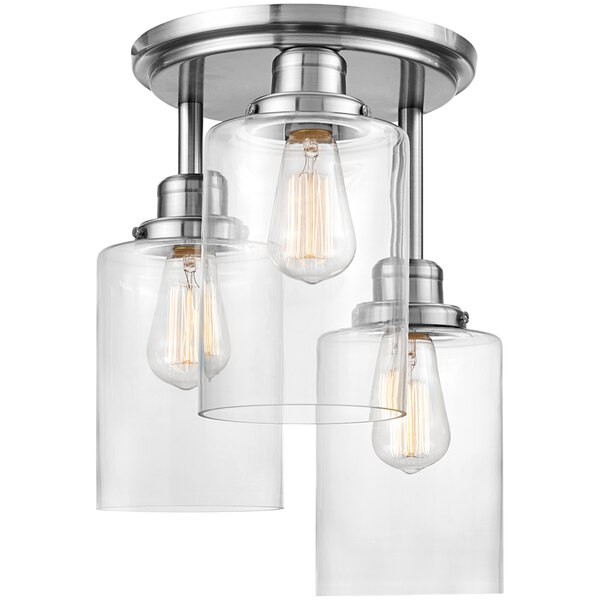 A Globe semi-flush mount light with clear glass shades.