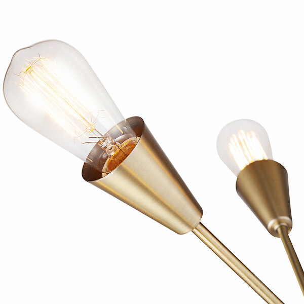 A Globe Matte Gold Semi-Flush Mount Light with two gold light bulbs.