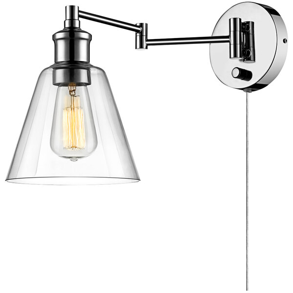 A Globe wall sconce with clear glass shade.