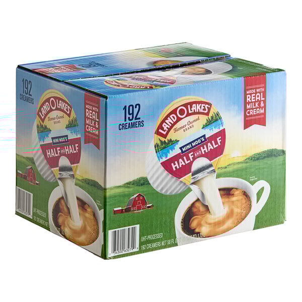 A box of Land O Lakes Mini Moo's half and half single serve cups on a counter.