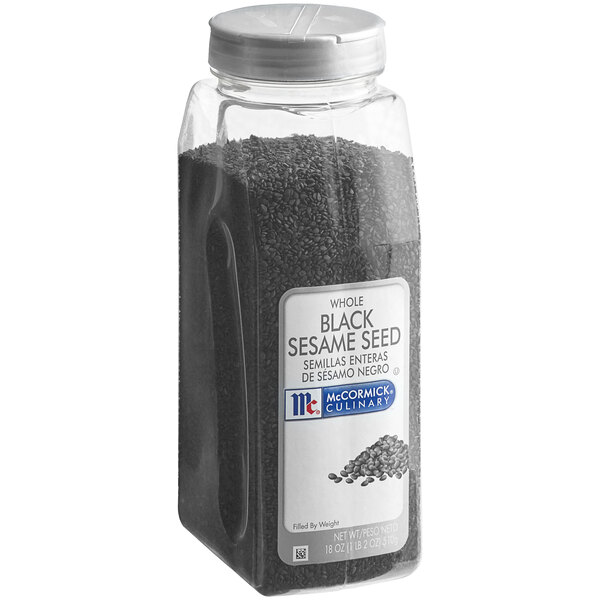 A plastic container of McCormick Culinary Black Sesame Seeds.