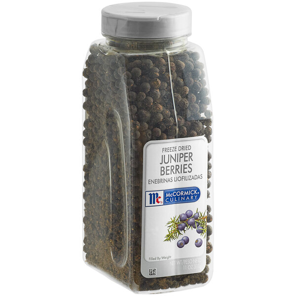 A plastic container of McCormick Culinary Freeze-Dried Juniper Berries with a label on it.
