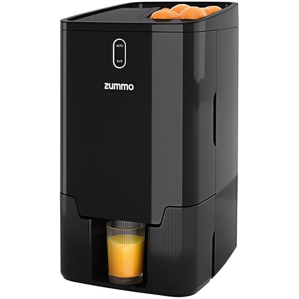 A black Zummo Viva Z25 juicer with oranges in it.