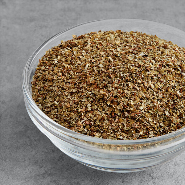 A bowl of McCormick Culinary Marjoram Leaves.