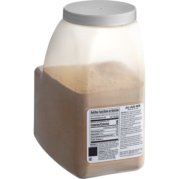 A plastic container of brown powder.