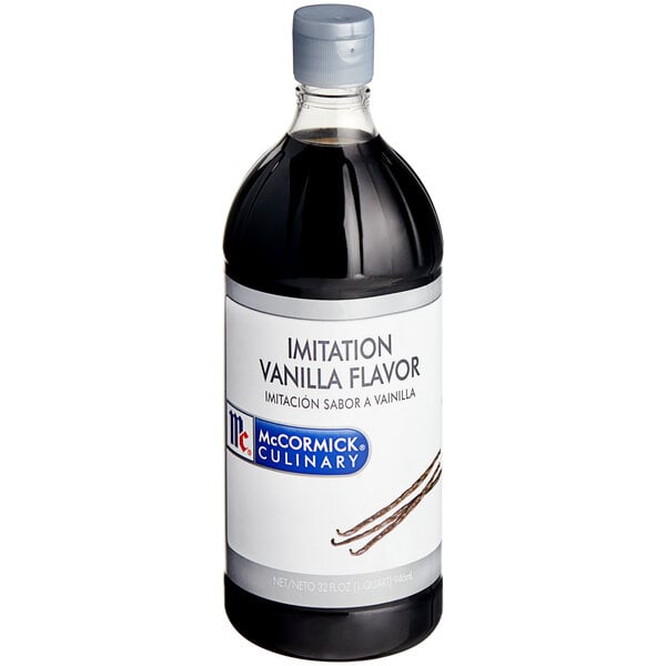 A close up of a McCormick Culinary Imitation Vanilla bottle with a white label.