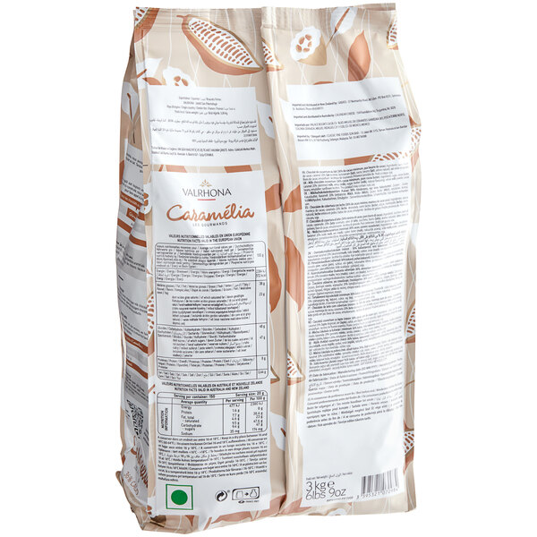 A bag of Valrhona Caramelia milk chocolate feves with a label.