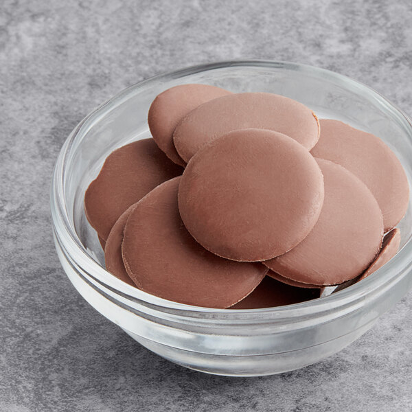 A bowl of Republica del Cacao milk chocolate couverture.