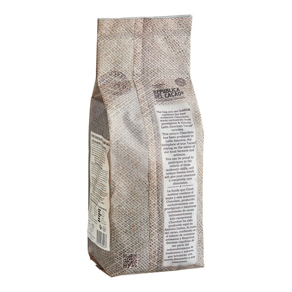 A close-up of a bag of Republica del Cacao dark chocolate on a white background.