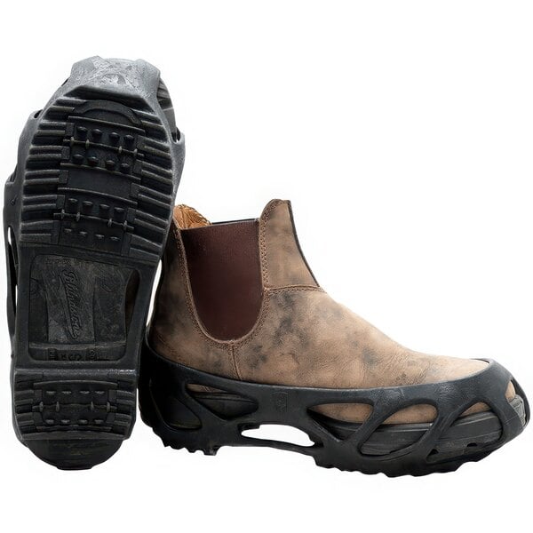 A pair of brown boots with black Impacto SLK GRIP overshoes.